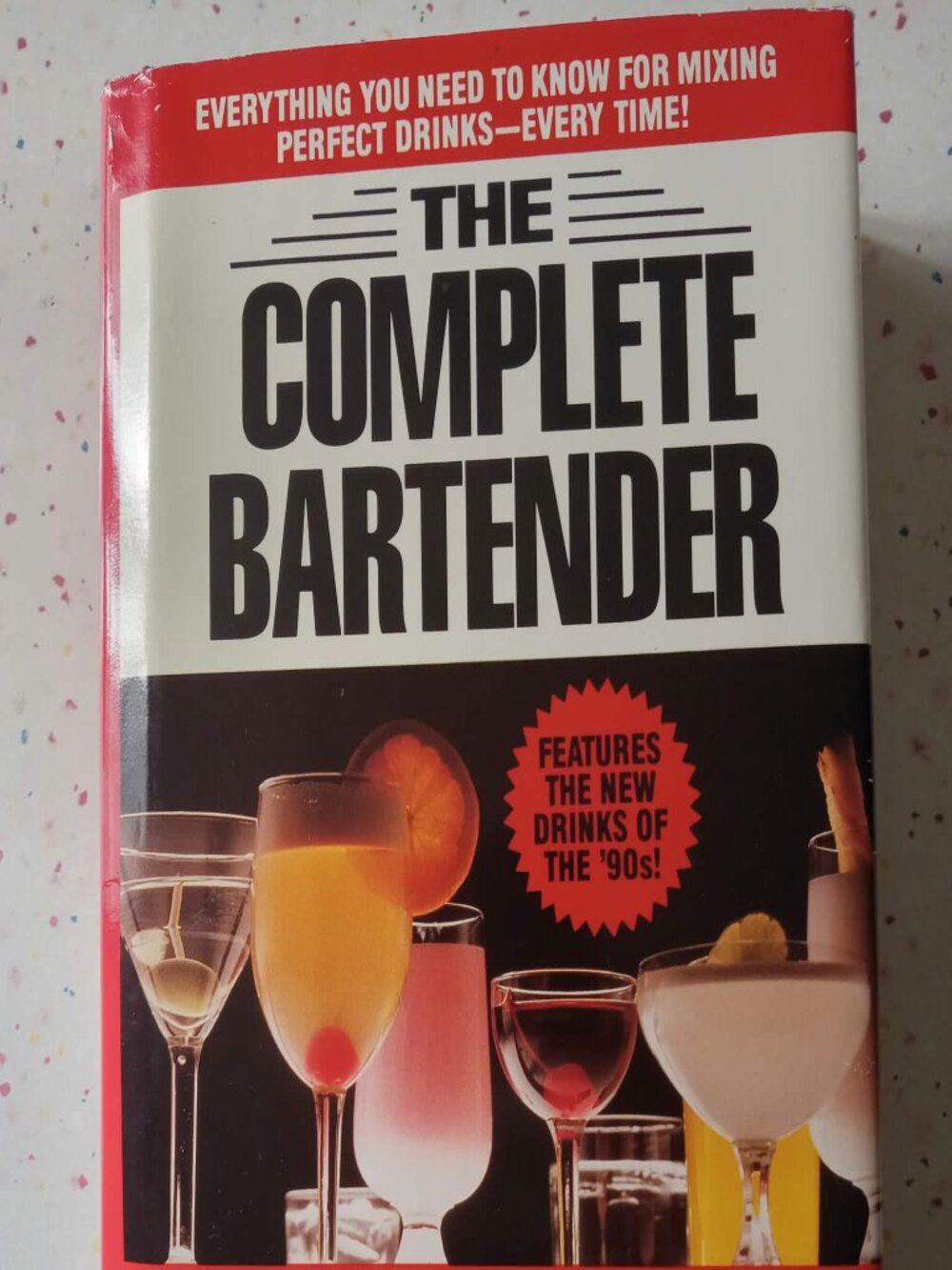 The Complete Bartender retro bar book copyright 1990